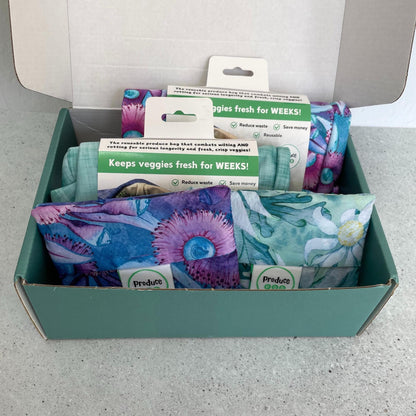 Contents of Produce Pod pod and shoppers gift set: pods in ocean and gum blossom and shopper bags in gum blossom and flannel flower shown inside the box.