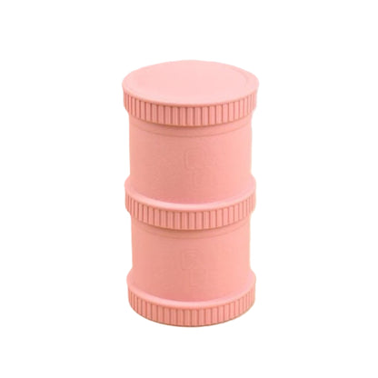 Baby Pink Re-Play Snack Stack set showing a fully assembled pair of airtight, stackable travel food pods for kids' daycare snacks.