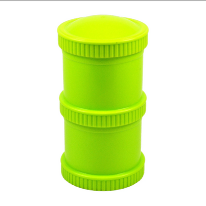 Green Re-Play Snack Stack set showing a fully assembled pair of airtight, stackable travel food pods for kids' daycare snacks.