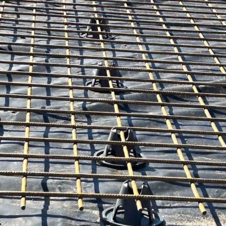 Sustainable concrete rebar chairs made from 100% recycled Dulux powder coating waste, compliant with AS2425 structural reinforcement standards in position ready for concrete.