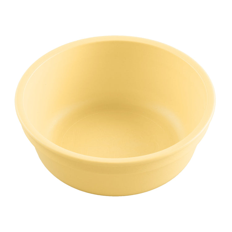 Single Re-Play recycled plastic deep kids feeding bowl with gently curved sides on a clean white background, available in Australia in Lemon Drop .