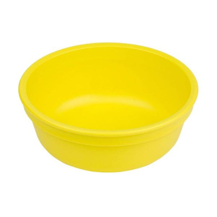 Single Re-Play recycled plastic deep kids feeding bowl with gently curved sides on a clean white background, available in Australia in Yellow.