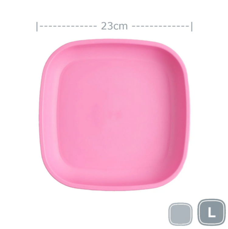 Single Re-Play recycled plastic large flat dinner plate with deep rim edges on a clean white background, available in Australia in bright pink.