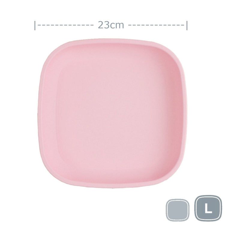 Single Re-Play recycled plastic large flat dinner plate with deep rim edges on a clean white background, available in Australia in Ice Pink