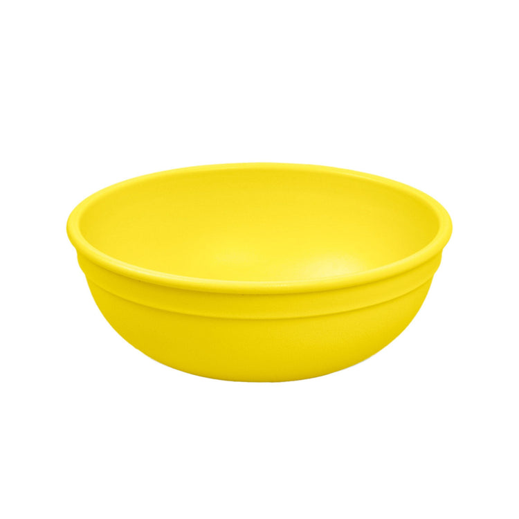 Single Re-Play recycled plastic large kids bowl with deep sloping walls on a clean white background, available in Australia in Yellow