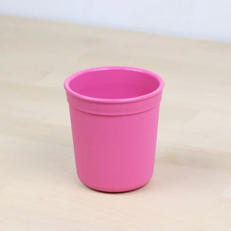 Single Re Play recycled plastic tiny tumbler open cup base with a textured grip surface on a clean white background, available in Australia in bright pink.