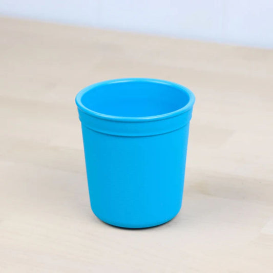 Single Re Play recycled plastic tiny tumbler open cup base with a textured grip surface on a clean white background, available in Australia in sky blue.