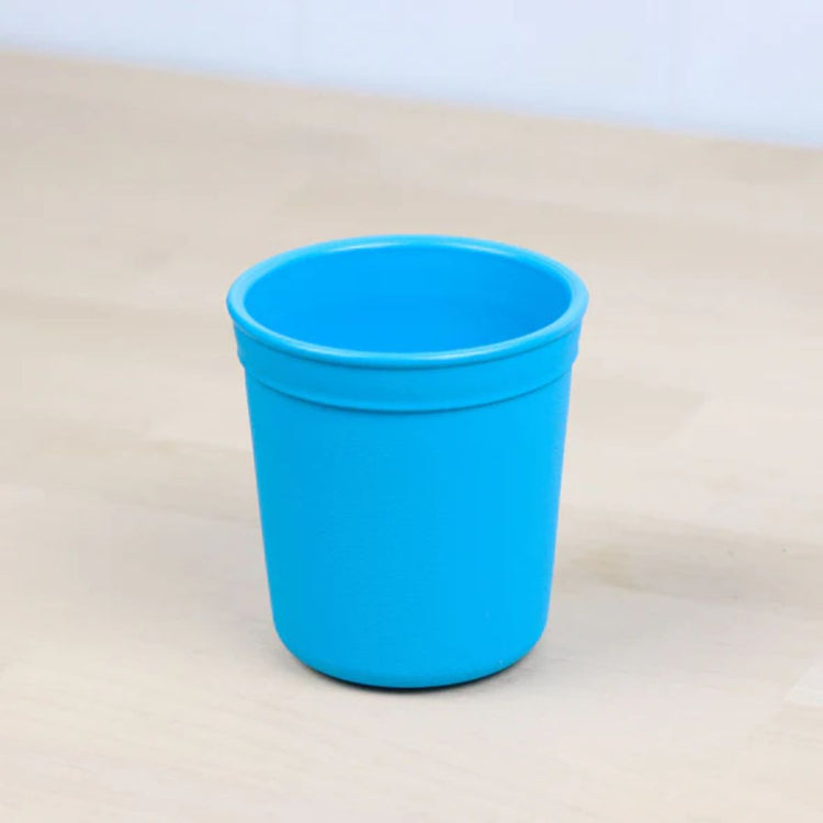 Single Re Play recycled plastic tiny tumbler open cup base with a textured grip surface on a clean white background, available in Australia in sky blue.
