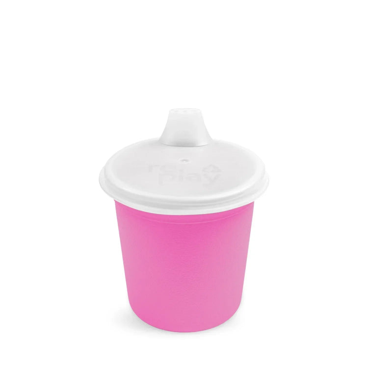Single Re Play recycled plastic tiny tumbler training cup assembled with its matching sip lid on a clean white background, available in Australia in right pink.