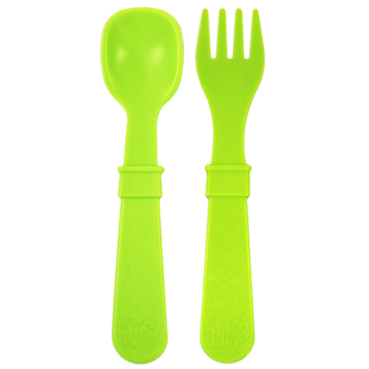 Single matching Re Play recycled plastic toddler fork and spoon cutlery set on a clean white background, available in Australia in Green