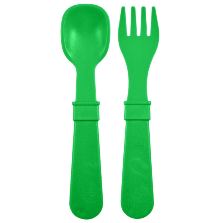 Single matching Re Play recycled plastic toddler fork and spoon cutlery set on a clean white background, available in Australia in kelly green