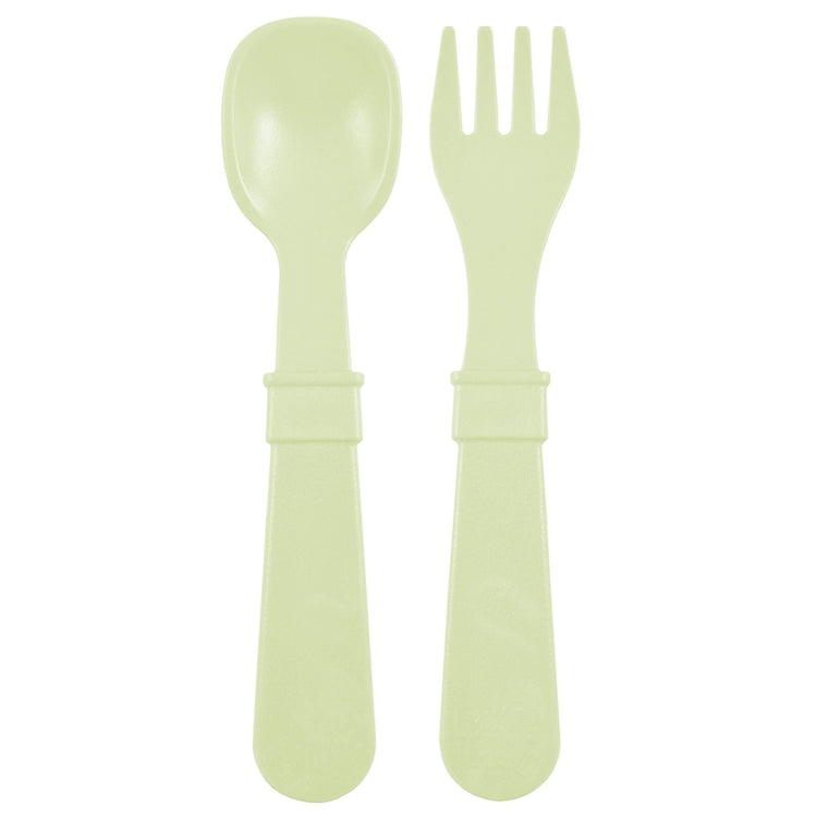 Single matching Re Play recycled plastic toddler fork and spoon cutlery set on a clean white background, available in Australia in Leaf