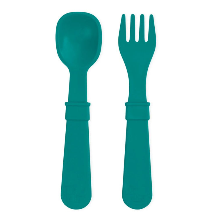 Single matching Re Play recycled plastic toddler fork and spoon cutlery set on a clean white background, available in Australia in teal