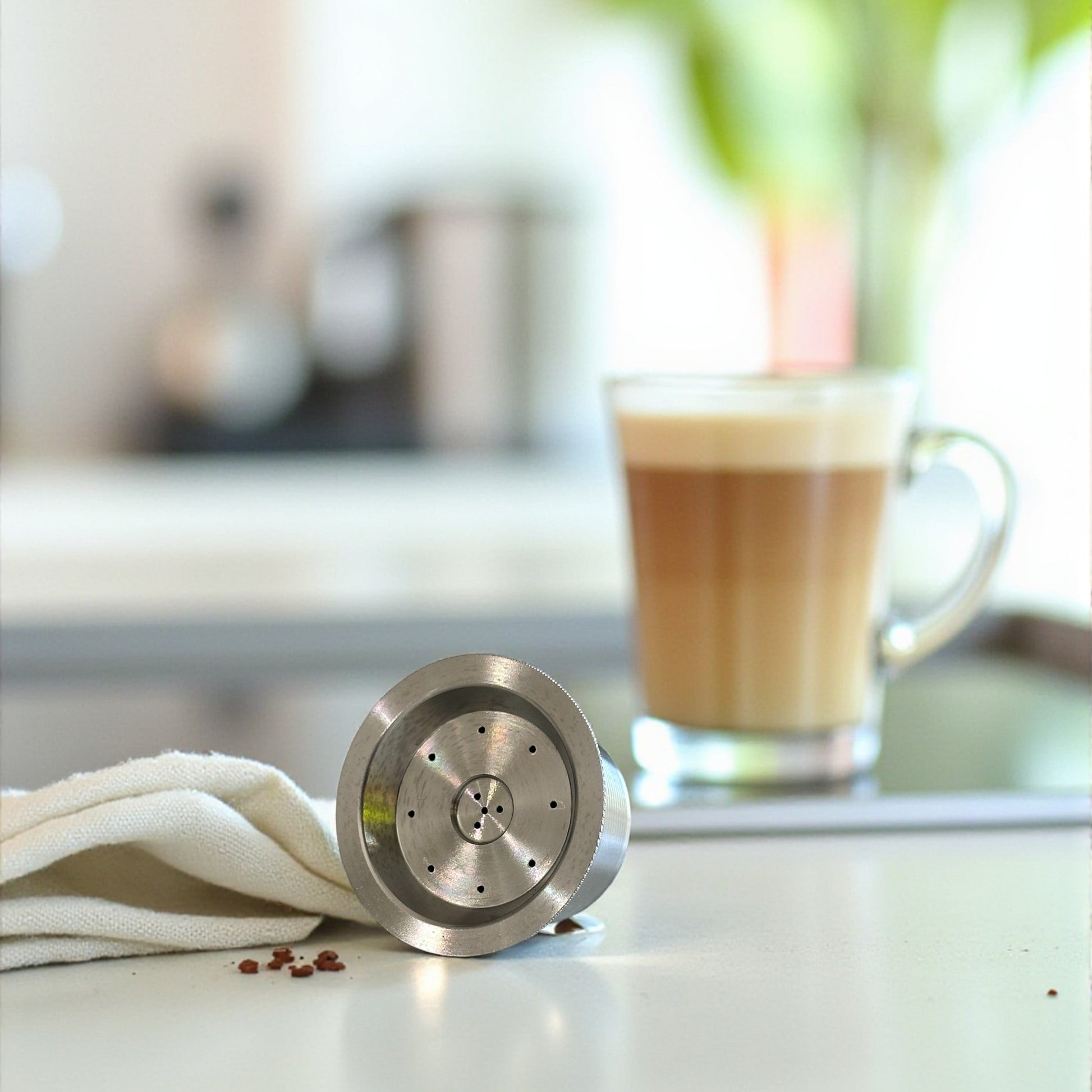 A single stainless steel reusable coffee pod for Aldi K-fee, Caffitaly or Verismo machines.