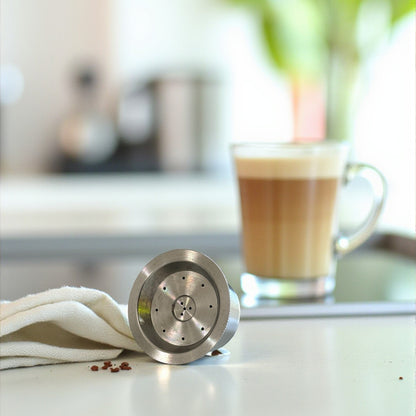A single stainless steel reusable coffee pod for Aldi K-fee, Caffitaly or Verismo machines.