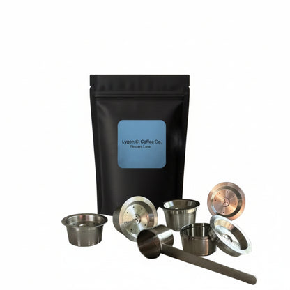 Pod Star family pack for Aldi K-fee and Caffitaly users with four reusable stainless steel pods, tamper, scoop, and coffee.