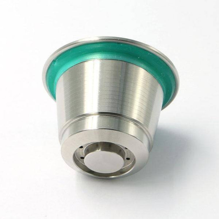 Pod Star marine-grade 316L stainless steel reusable coffee capsule shown back view on a white background, designed for Nespresso Original line machines.