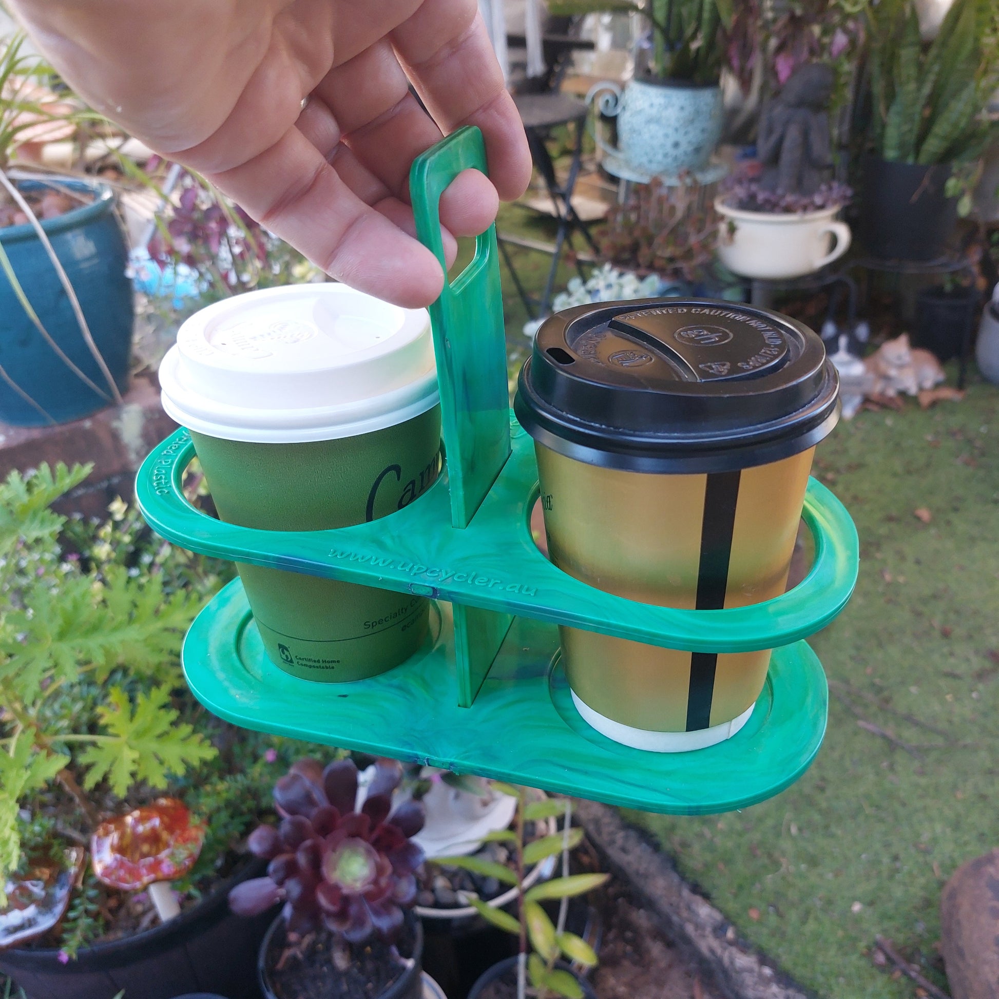 Using the eco friendly EcoSip Duo coffee carrier on a morning cafe run. Practical, durable, and dishwasher safe.