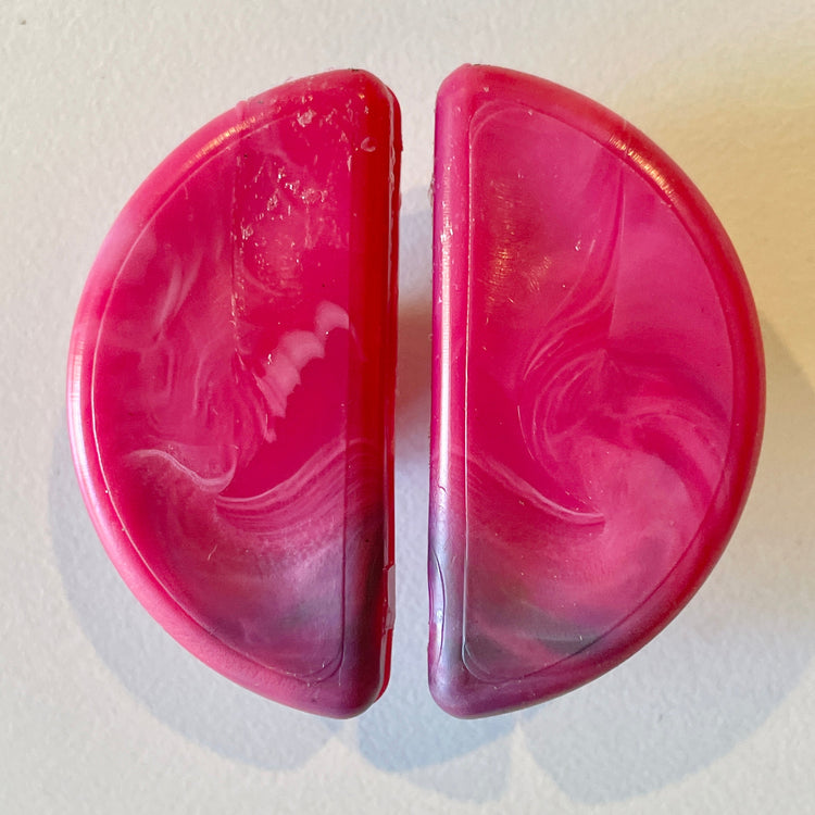 Semi-circle 50mm finger pull cabinet handle in pink finish. Premium kitchen cupboard hardware in Australia.