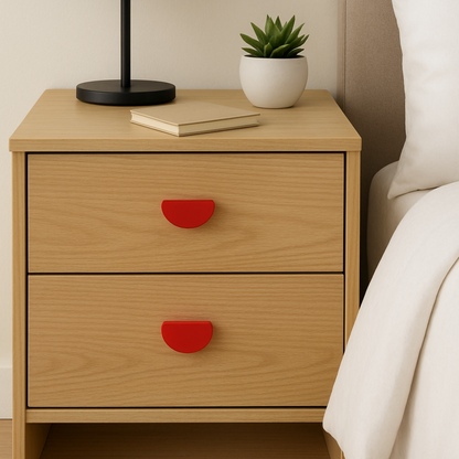 Pair of semi-circle finger pull handles installed on drawer doors creating a contemporary interior design.