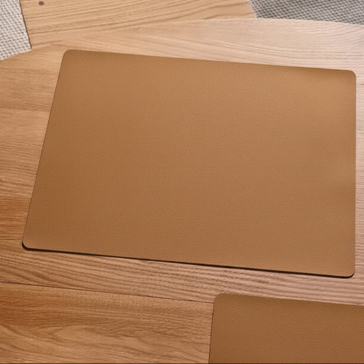 Square recycled leather placemat featuring the signature LIND DNA Serene soft polished finish and subtle suede-like texture on a table top.