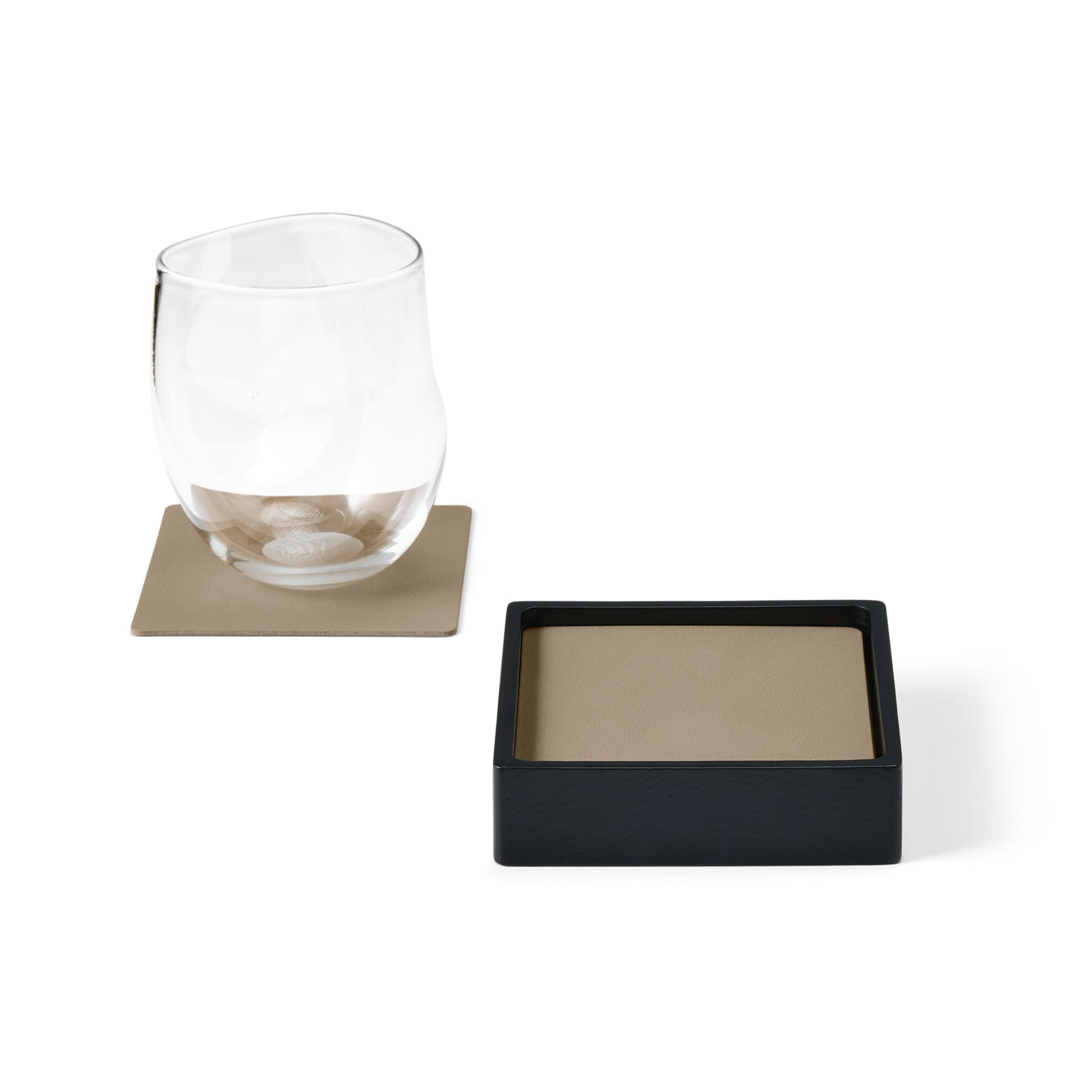Square recycled leather coaster box with coasters with a single coaster and glass showing LIND DNA texture.