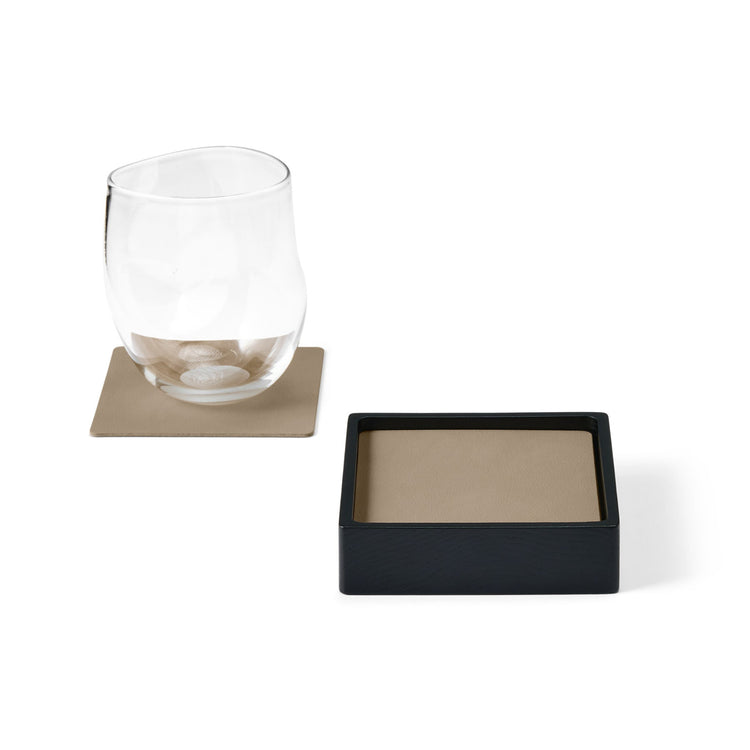 Square recycled leather coaster box with coasters with a single coaster and glass showing LIND DNA texture.