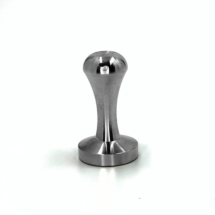 Durable stainless steel coffee packing tamper designed to compress coffee grounds evenly into Pod Star reusable capsules.