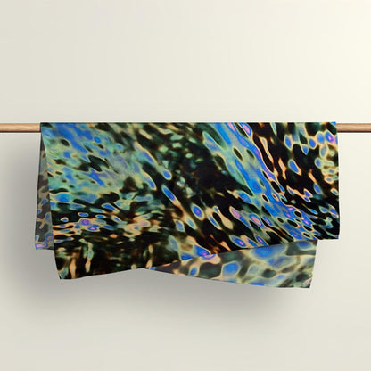 Digital puddle pattern fabric wrap by Wrap Revolution hanging over a wooden rod.