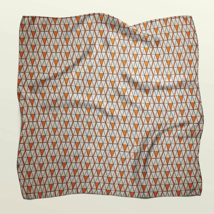 Flat unfolded sheet of Triangulation reusable fabric wrap. Zero-waste textile alternative to paper wrapping.
