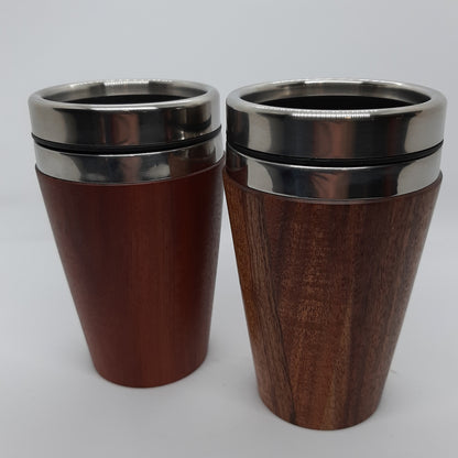 Two insulated hand-turned recycled timber coffee travel mug with a stainless steel interior lining, handcrafted in Australia by Lyons Woodturning showing small size.