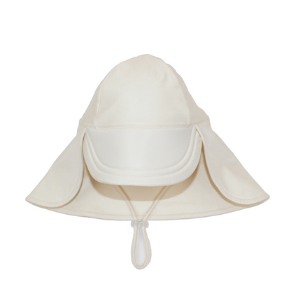 Cream Tyoub baby legionnaires swim hat featuring a deep protective sun peak and adjustable toggle chin strap.
