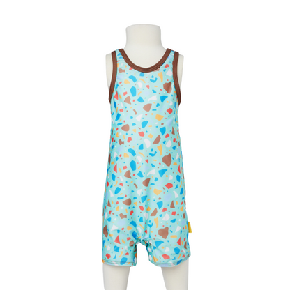 Child's one piece zootie swimsuit in sea green ocean glass color block.