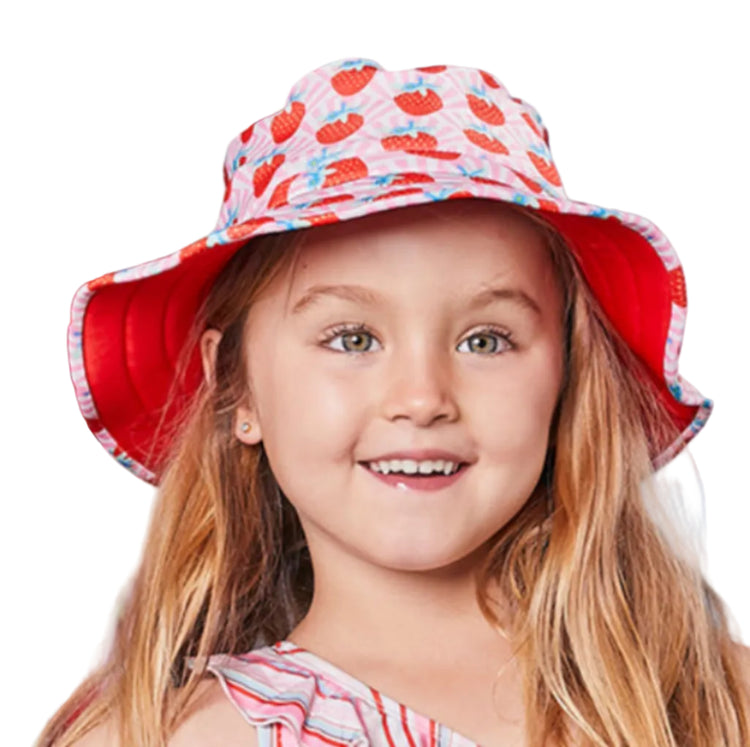 Kids reversible wide brim swim bucket hat in a vibrant red strawberry sundae print with white seed accents.