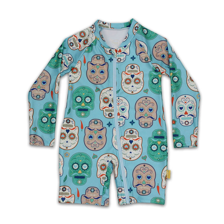 Kids long sleeve one piece sunsuit in an aqua blue Skulls Amigo sugar skull pattern with a full zip front closure.