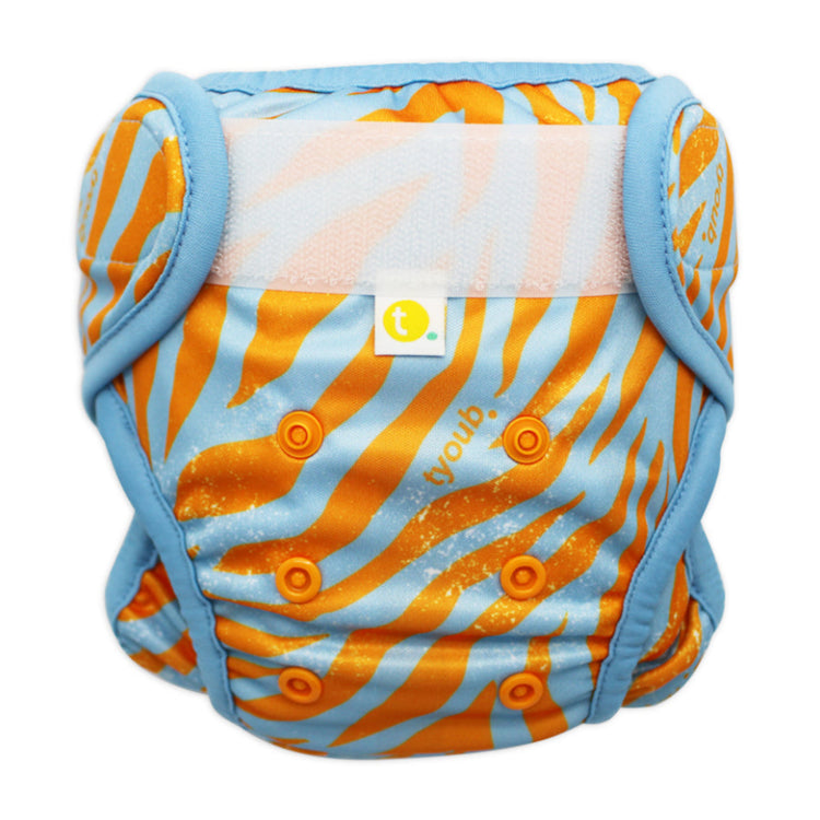 Close-up of adjustable front snaps and leakproof double leg gusset onTiger blue orange swim nappy.