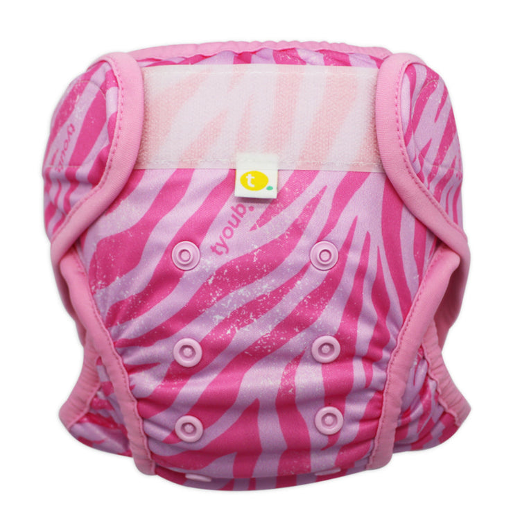 Close-up of adjustable front snaps and leakproof double leg gusset on Tiger pink swim nappy.
