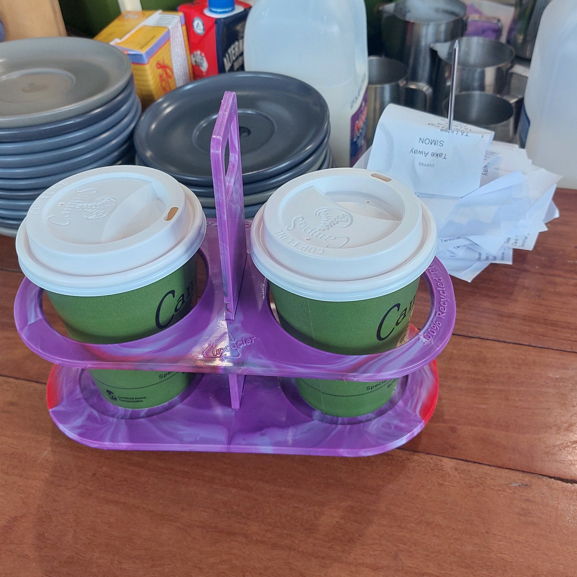Top-down view of the reusable 2 cup coffee holder slots, designed to prevent spills during morning drink runs.