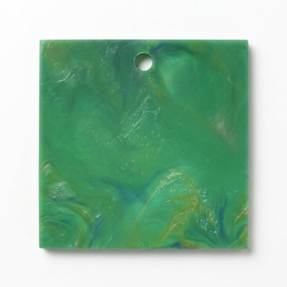 Colour and texture swatch for the Upcycler recycled plastic range in green.