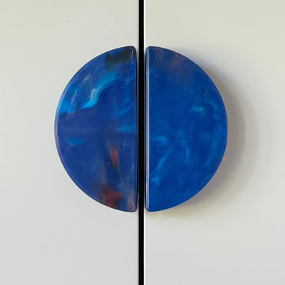 Pair of Upcycler recycled plastic semi circle cabinet handles forming a full circle. Eco hardware made in Lismore Australia.