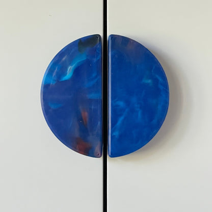 Pair of Upcycler recycled plastic semi circle cabinet handles forming a full circle. Eco hardware made in Lismore Australia.