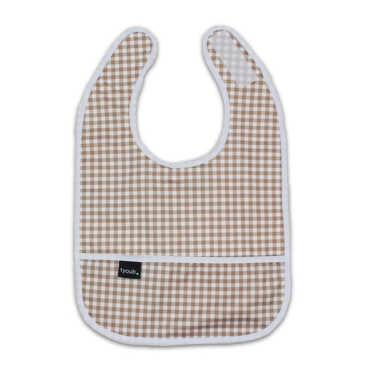 Lightweight waterproof baby bib in fawn check with an integrated crumb catch-all front pocket.