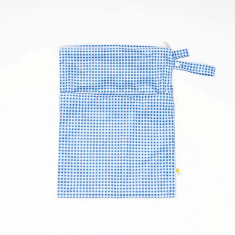 Waterproof baby travel wet bag in blue check print, featuring a secure zipper and snap pram loop.