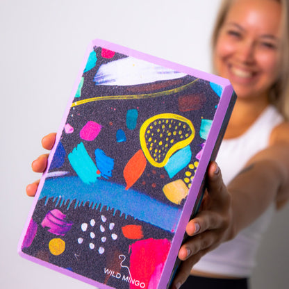 Close-up view of the Wild Mingo printed yoga block showing the comfortable bevelled edges designed for a secure non-slip grip.