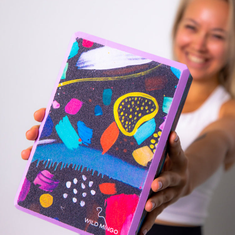 Close-up view of the Wild Mingo printed yoga block showing the comfortable bevelled edges designed for a secure non-slip grip.