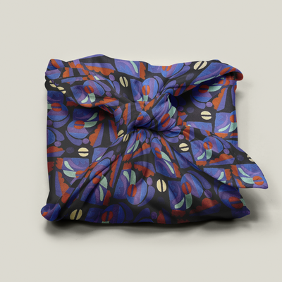 Wrap Revolution Tribal Beats fabric gift wrap tied around a gift box. Sustainable furoshiki wrap in Australia.