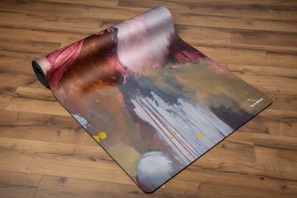 Yoga Mat | Wild Mingo | Gold Recycled Rubber & Microsuede Non-Slip half rolled on a wooden studio floor
