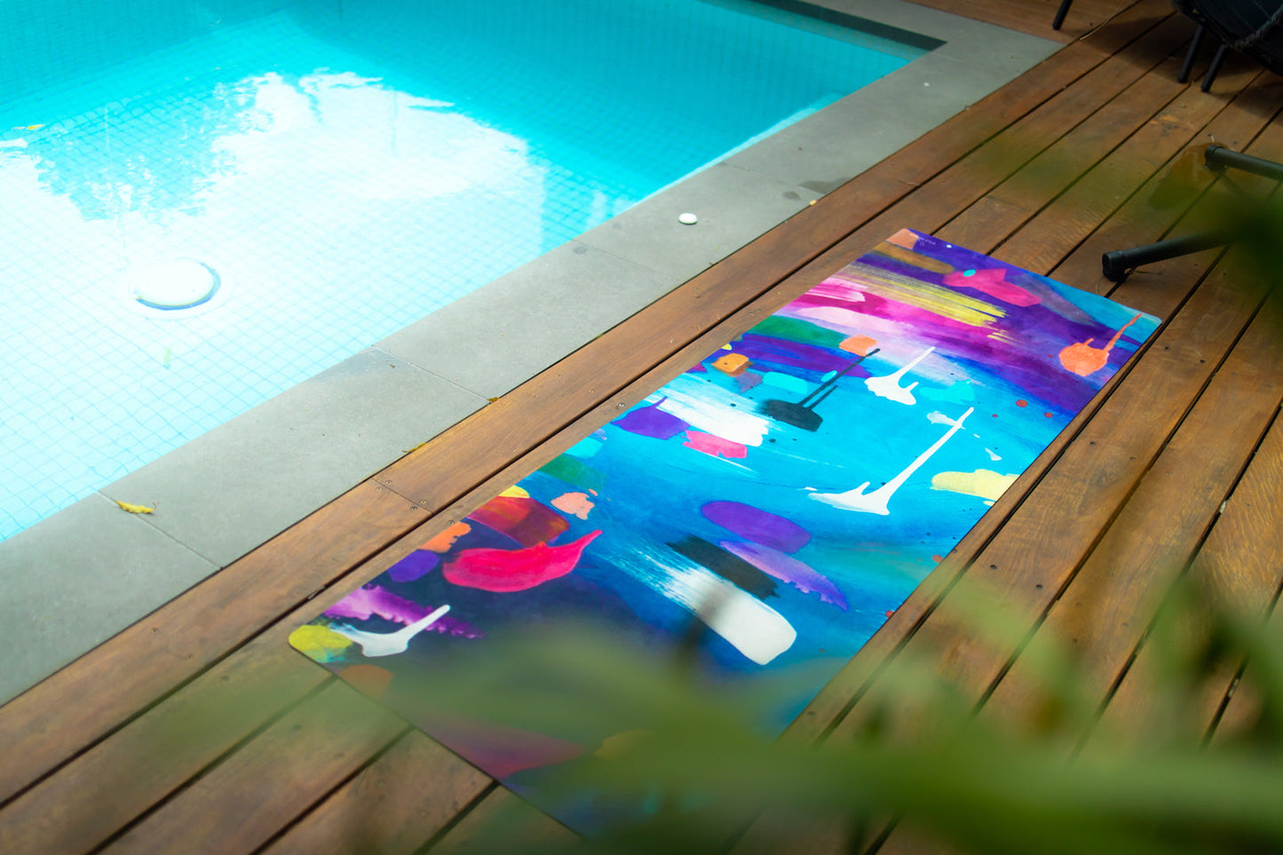 Yoga Mat | Wild Mingo | Oorunye Recycled Rubber & Microsuede Non-Slip unrolled on a pool deck