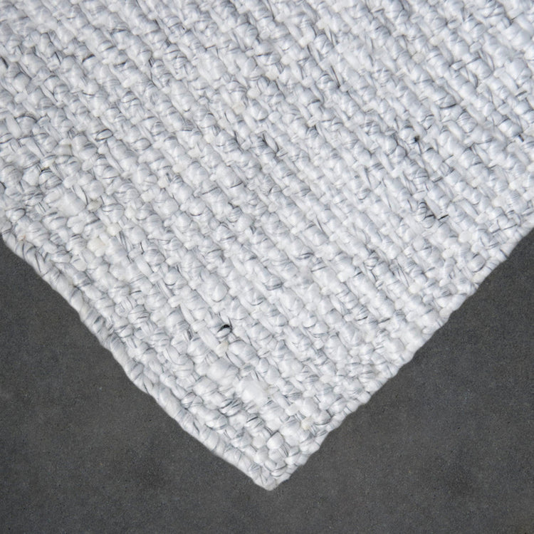 Zebra Home Drake Lite ivory off-white washable outdoor doormat placed at a home entryway.